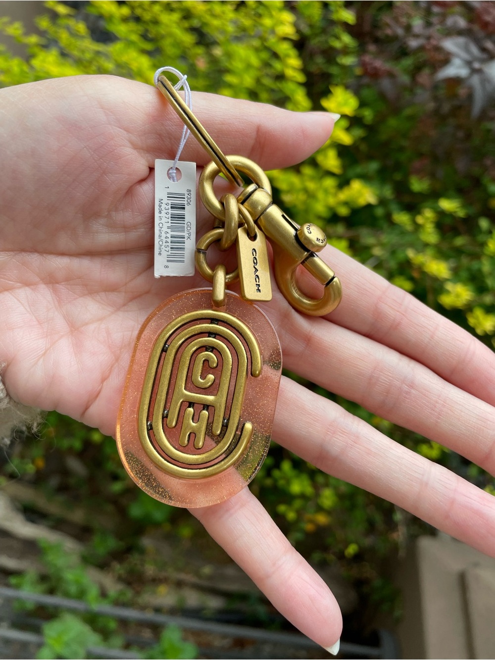 Coach Rose Gold Toned Acrylic Logo Key Fob with Brass Hardware